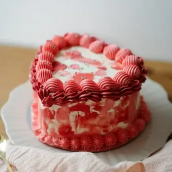 Red heart-shaped vintage cake